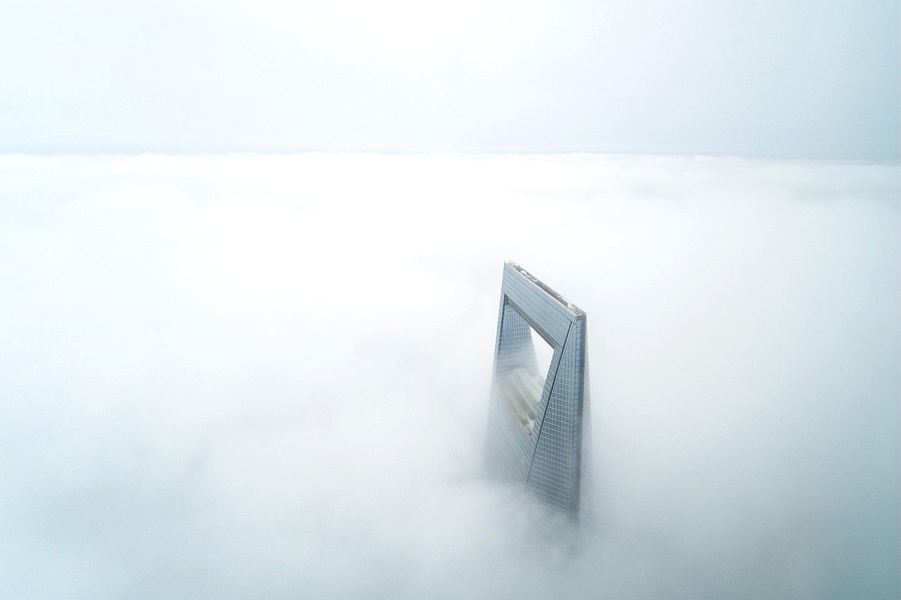 Consultant reviewing financial reports on tablet